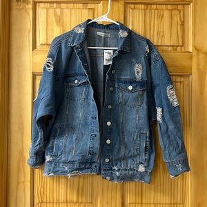 Medium blue ripped denim jacket
